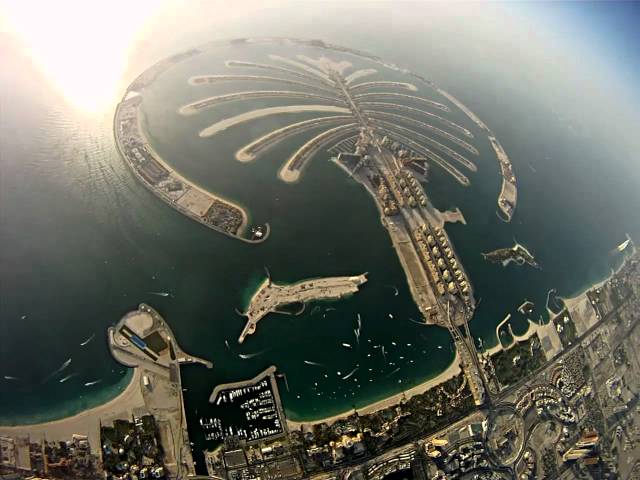 Skydive Dubai. Wingsuit flying above skyscrapers and Palm Jumeirah.